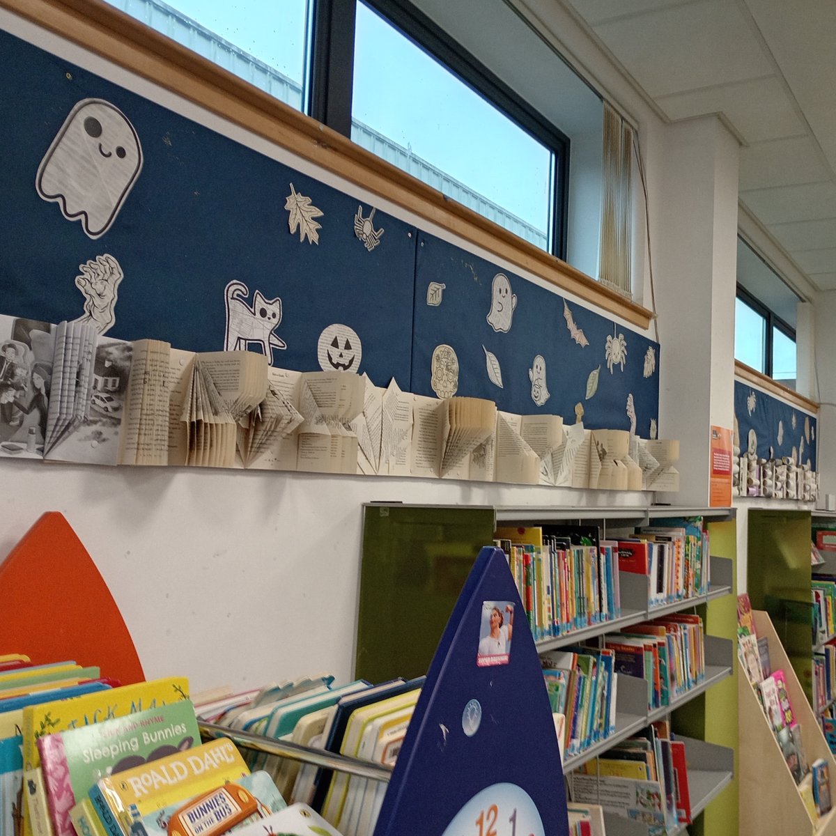LibrariesNL's tweet photo. Have you spotted the wonderfully spooky displays in #CoatbridgeLib? Made by creatively upcycling much-loved old library books, they're sure to get you in the Halloween spirit! https://t.co/x2We0xe2nE