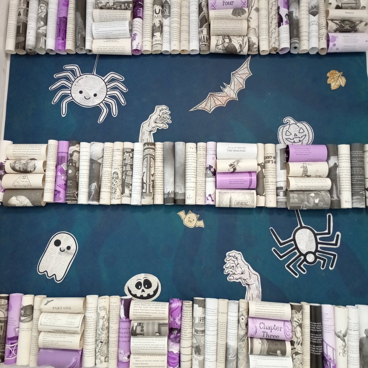LibrariesNL's tweet photo. Have you spotted the wonderfully spooky displays in #CoatbridgeLib? Made by creatively upcycling much-loved old library books, they're sure to get you in the Halloween spirit! https://t.co/x2We0xe2nE