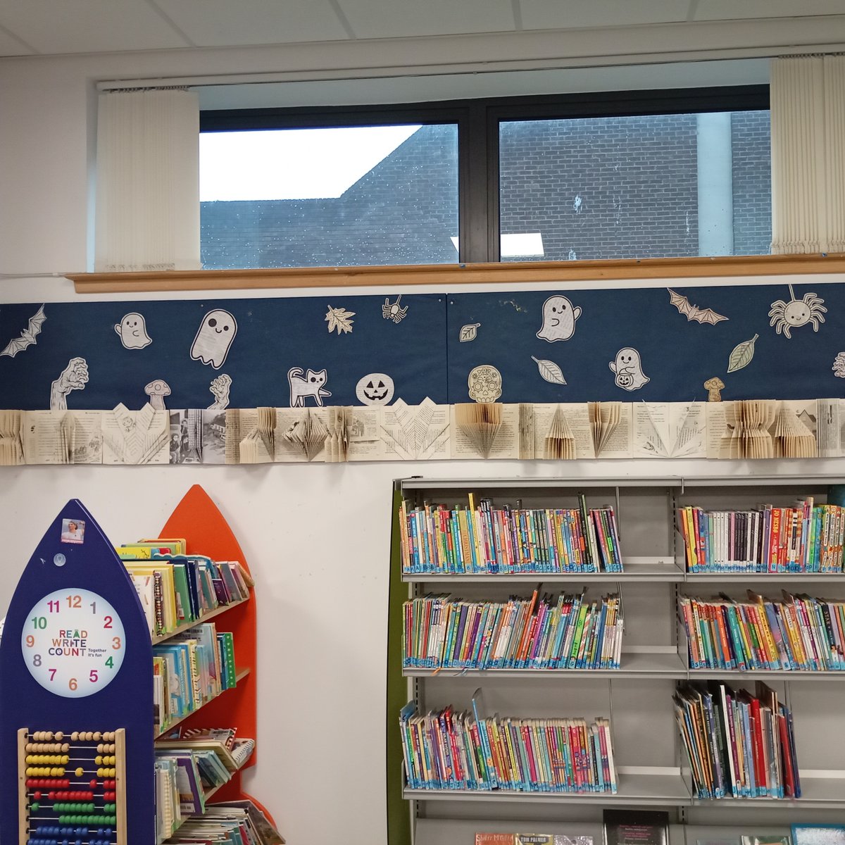 LibrariesNL's tweet photo. Have you spotted the wonderfully spooky displays in #CoatbridgeLib? Made by creatively upcycling much-loved old library books, they're sure to get you in the Halloween spirit! https://t.co/x2We0xe2nE