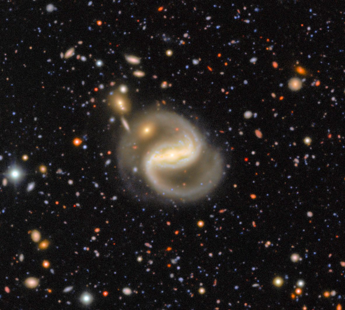 VRubinObs's tweet photo. If galaxies had signature dance moves, this one's would be the spiral swirl 💃🌀

Meet Z 36-24, a barred spiral galaxy with two swirly arms. Bars are a common feature in spiral galaxies, where the arms connect to a straight bar of stars across its center. https://t.co/HdVMeq2AkU