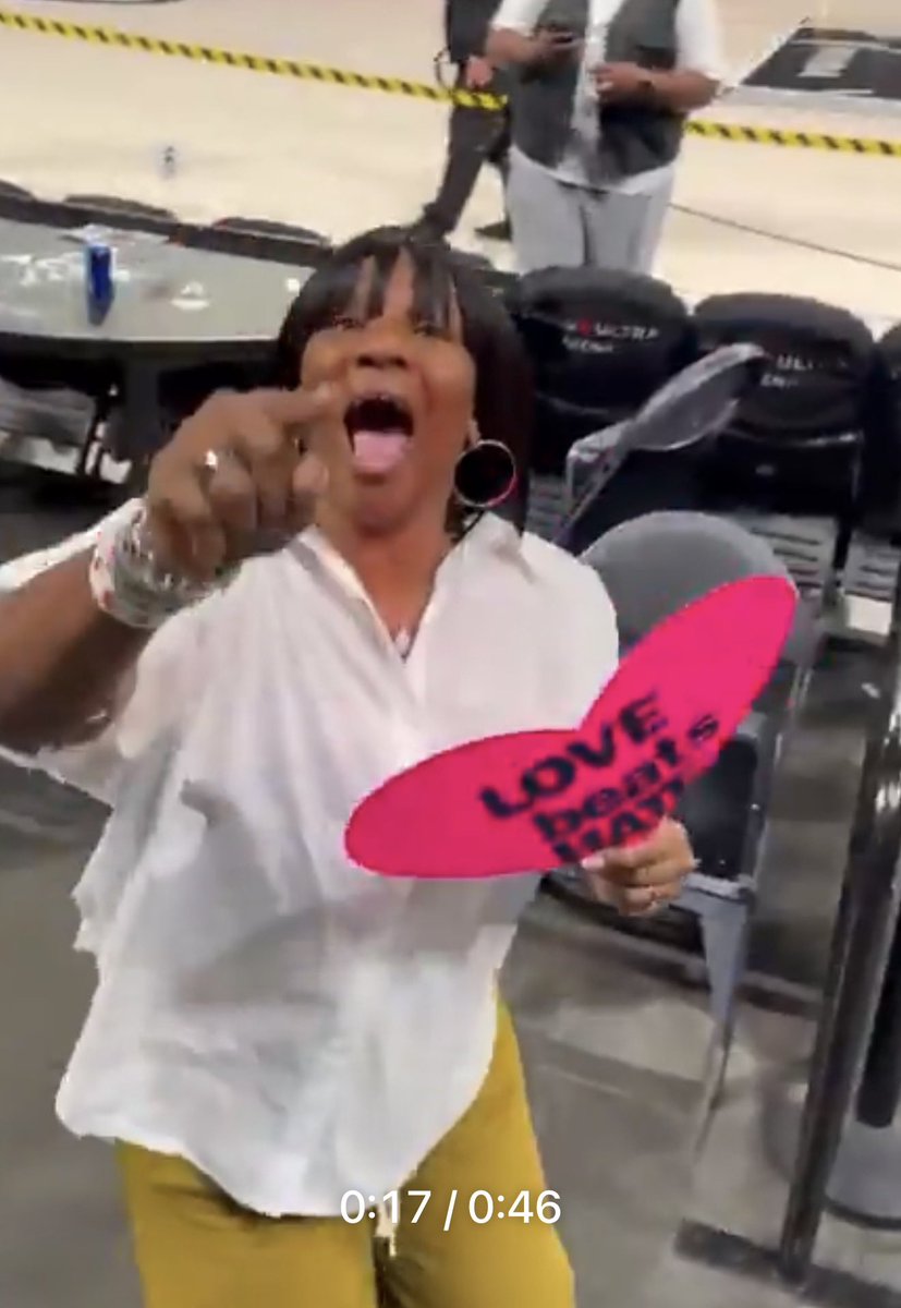 proamericapol's tweet photo. A'Ja Wilson's mother got in a screaming match with a fan.

Here's the funny part.

She POINTS at the guy.

The exact same gesture her daughter claimed was a symbol of hate and the patriarchy asserting it's dominance.

They're complete frauds.

Don't let the WNBA get away with the hypocrisy.