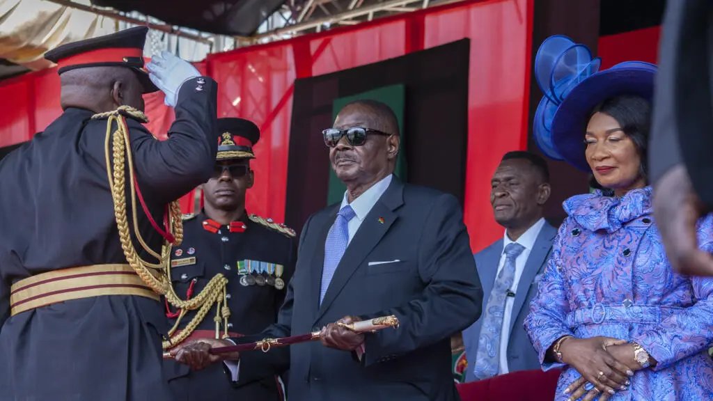 jahman_adamski's tweet photo. Connecting the dots: Wicknell Chivayo, gold smuggling, & terrorism.

We all know the brutal conflict in Sudan between the paramilitary Rapid Support Forces (RSF) & the regular army has been raging since April 2023. But just yesterday, a massive bomb dropped in Malawi: General Paul Valentino Phiri was arrested by the Anti-Corruption Bureau. The charge? Alleged involvement in property deals linked to "terrorism." In plain terms, he’s accused of helping arm Sudanese rebels with heavy weaponry.

This isn't a sudden development. Back in July 2025, a Platform for Investigative Journalism (PIJ) report revealed that US intelligence believed top Malawian military officials were secretly funnelling heavy arms to Sudan.

Now, this is where Wicknell Chivayo enters the frame. It’s well-documented that Chivayo met with former Malawian President Peter Mutharika multiple times, & he also had sit-downs with Lazarus Chakwera. While the investigators targeting General Phiri haven’t officially named the financial backer behind these massive weapon shipments—which are rumoured to be worth up to $4 billion—the word on the street points squarely at Chivayo. We all know Chivayo was just a front. There is really only one person who controls that kind of liquid cash, largely because they can’t use standard banking channels.
While there is no paper trail proving who funded the July 2025 weapons shipment, look at the timeline: on July 15, 2025, Chivayo flew into Malawi & met with then-President Chakwera. Is that just a coincidence? Highly unlikely. I mean days before the shipment.

To understand the scale of this, you have to look at the money. Gold is the lifeblood of the RSF; they control the mines in Darfur, mill the ore, & smuggle the metal out of Sudan. That’s where Kenya comes in as a major transit hub. Including Tanzania. In February 2025, Nairobi even hosted RSF political meetings, & Kenyan President William Ruto was spotted personally chauffeuring Chivayo around recently. Ruto himself has faced heavy accusations of holding personal & commercial ties to the RSF, mostly tied to gold smuggling. To add fuel to the fire, in June 2025, the Sudanese government claimed they discovered Kenyan-labelled weapons and ammunition hidden in RSF caches across Khartoum and Omdurman.
Chivayo simply knew too much. It's telling that he wasn't around to see General Phiri's arrest. Did the heat finally get to him? Did US intelligence catch up with him? Or did his handlers realize the net was closing in, choosing to eliminate him & his wife—who was by his side through it all—to erase their own ties to international terrorism?

What happened right after Chivayo’s helicopter crashed tells you everything you need to know. Within minutes, the army swarmed his mansion & completely locked it down. Nobody was allowed inside. Not family, not friends—absolutely no one.

Neighbours made complaints about mysterious digging in Chivayo’s garden. The excavation was so intense that tunnels began collapsing, causing cracks to ripple through the walls of neighbouring homes. Chivayo was hoarding billions in gold, diamonds, & cash on that property because the people he associated with couldn't—or wouldn't—use banks. Tanzania president even offered to send mercenaries to help secure the house.

The sanctioned Dagalo family, who fund the RSF, have deep ties here. RSF leader Mohamed Hamdan Dagalo has held meetings with the exact same presidents we used to see Chivayo rubbing shoulders with. Including Rhamaposa who enjoyed an exclusive meeting with him.

Ultimately, Chivayo wanted to play with the big boys, but his pathological need to show off was his downfall. He ended up in a black bin bag. He was a careles operator who facilitated the funding of terrorism, smuggled gold, & laundered money, all while bleeding taxpayers dry to fund his lavish lifestyle. 

As for what happens next, we’ll have to watch General Phiri’s case unfold.
