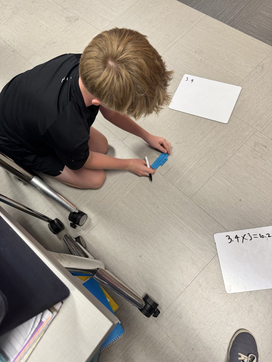 APondrom's tweet photo. Today our students were busy multiplying decimals using models! They created time-lapse videos to show their work and shared them with their classmates. It was so fun watching them show off what they learned and explain their thinking in their own way! @RISDmath @RISDiTeam https://t.co/EMXrshCljN