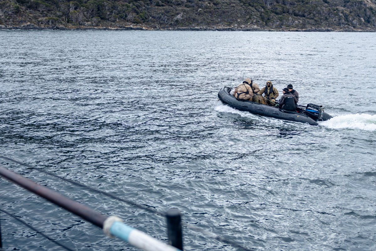 Southcom's tweet photo. U.S. Marines with the Marine Corps Mountain Warfare Training Center and Argentine marines assigned to the Batallon de Infanteria de Marina N 4 use a combat rubber raiding craft to conduct an amphibious landing during a long-distance movement exercise in Ushuaia, Argentina, Sept. 19, 2026. The training developed route-planning, mobility, and small-unit coordination skills in mountainous and coastal terrain.

@USMC @MARFORSOUTH @Armada_Arg @EmbajadaEEUUarg