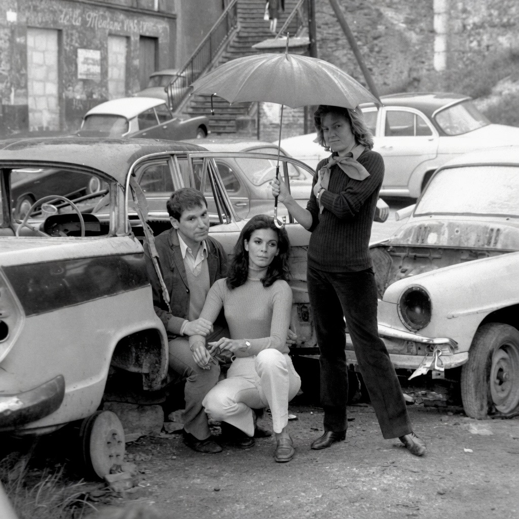 fofuchatany's tweet photo. Robert Hossein, Florinda Bolkan and Marina Cicogna, photographed by me during the filming of Nadine Trintignant’s Le voleur de crimes. Marina, the Italian co-producer with her renowned Euro International Films, visited the set on a rainy morning in https://t.co/WvA4R77kBP