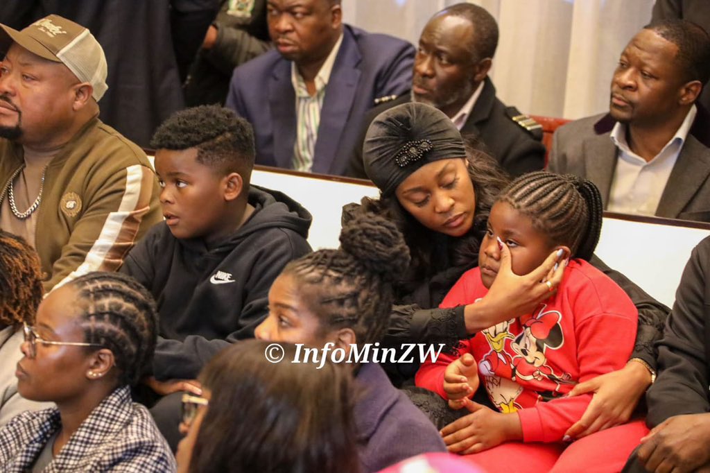 zimlive's tweet photo. 📸 President Emmerson Mnangagwa greets Wicknell Chivayo’s ex-wife Sonja Madzikanda at funeral wake in Gletwin. Her two children with the late tenderpreneur have made a surprise appearance after they were earlier reported to be receiving counselling by a family spokesman https://t.co/UsA4z25IXO
