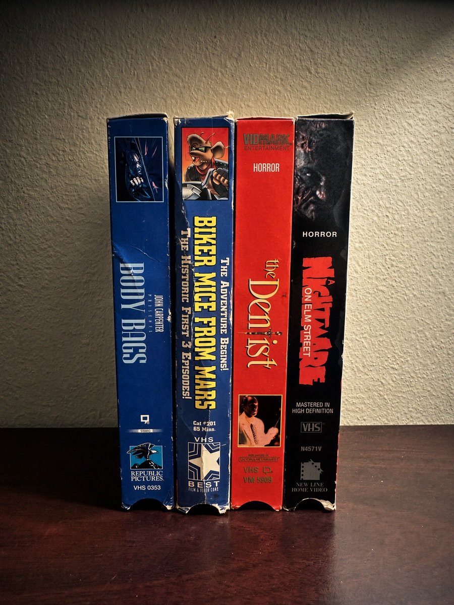 VHS__Nostalgic's tweet photo. Four tapes. One night. You’re only allowed to take one home. Which tape are you grabbing? #VHS https://t.co/ZnM9Tlw1BE