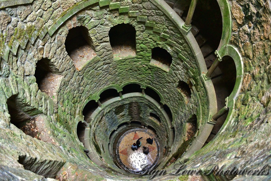 past_path's tweet photo. Then there's Quinta da Regaleira  and its "Initiation Well." 🌀

An inverted stone tower spiralling 27 metres straight DOWN into the earth. Nine landings. A Templar cross at the bottom. You climb down into the dark and out through a hidden tunnel.

Ancient Templar ritual site? https://t.co/JFGD0HaOYy