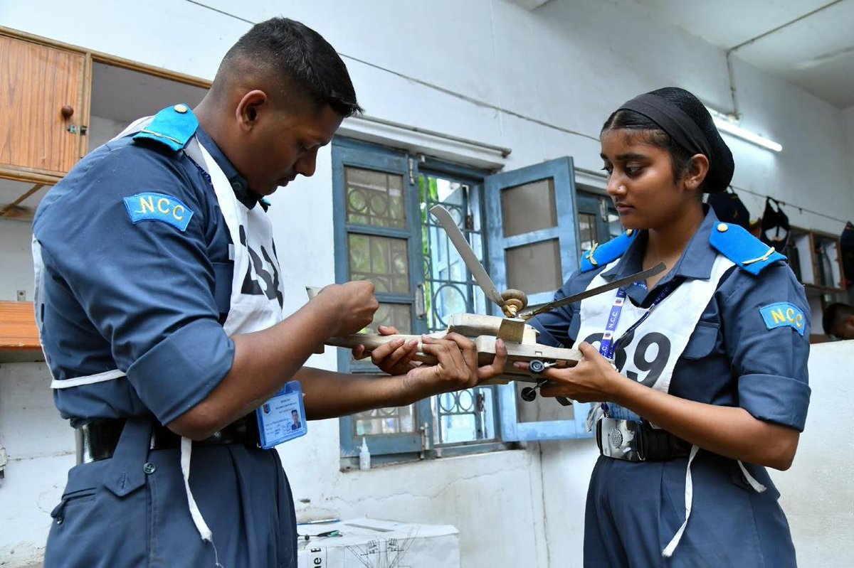 NCCDte_TNPAN's tweet photo. Day 3 of #AIVSC26 showed that champions are made long before take-off! ✈️🔥

The day began with energising PT, followed by the Health & Hygiene written test, a reminder that a fit body and a sharp mind are the first pillars of an aviator. In the workshops, RC and Control Line construction commenced, while DGNCC examiners meticulously carried out the Static Scale Assessment. Every wing profile, proportion and finish was scrutinised, because in scale modelling precision is everything and every millimetre reflects a cadet's patience and passion.

The CLABS capsule on leadership and mindfulness inspired cadets with a powerful message: true leaders first master themselves, then rise to command the skies.

With the lots drawn for all competitions, the stage is set and the contest is heating up. 💪

Seventeen Directorates. One sky. Unlimited ambition