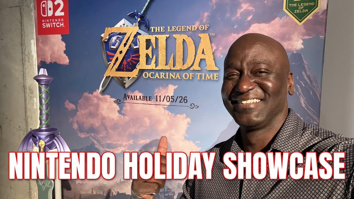 A man smiles and gives a thumbs-up in front of a promotional poster for "The Legend of Zelda: Ocarina of Time" on Nintendo Switch 2, with "NINTENDO HOLIDAY SHOWCASE" overlaid in bold text. The image illustrates the post about attending the Nintendo Holiday Showcase event in New York City.