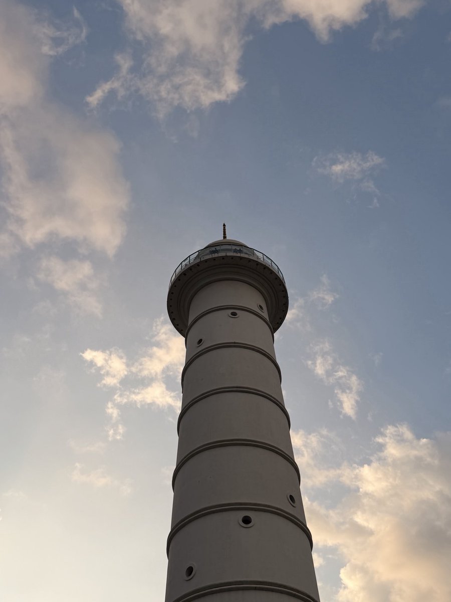 shbkes's tweet photo. I wonder how lonely Dharahara might feel. There are so many buildings around it and in the whole country yet there’s nothing like it. It still stands proudly. The reason it is tall is it’s looking for something of its kind; doesn’t find any. It’s closer to the sky than find them. https://t.co/ov0OxPLP9V
