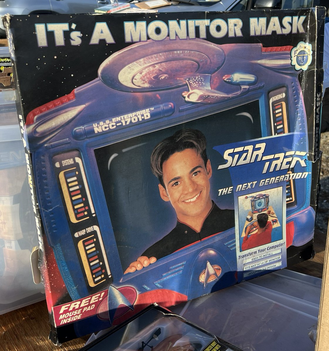 RetroFox8Bit's tweet photo. Flea Market Friday - saw a Star Trek TNG themed CRT mask thing. The funny part is on the back is an ad to collect all the various desk accessories to just completely nerd out your computer desk. :) Didn't ask price on the mask, just fun to see. https://t.co/HXqKWJbvMT