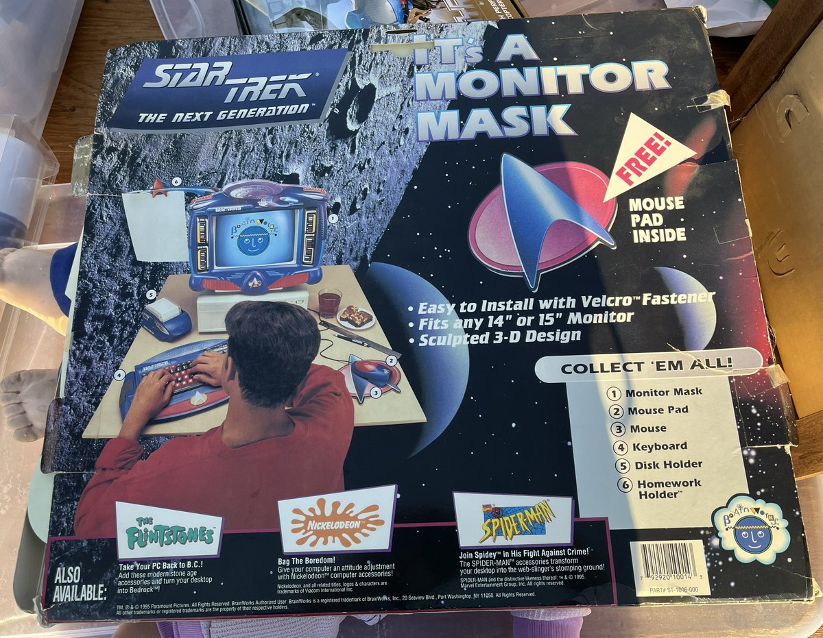 RetroFox8Bit's tweet photo. Flea Market Friday - saw a Star Trek TNG themed CRT mask thing. The funny part is on the back is an ad to collect all the various desk accessories to just completely nerd out your computer desk. :) Didn't ask price on the mask, just fun to see. https://t.co/HXqKWJbvMT