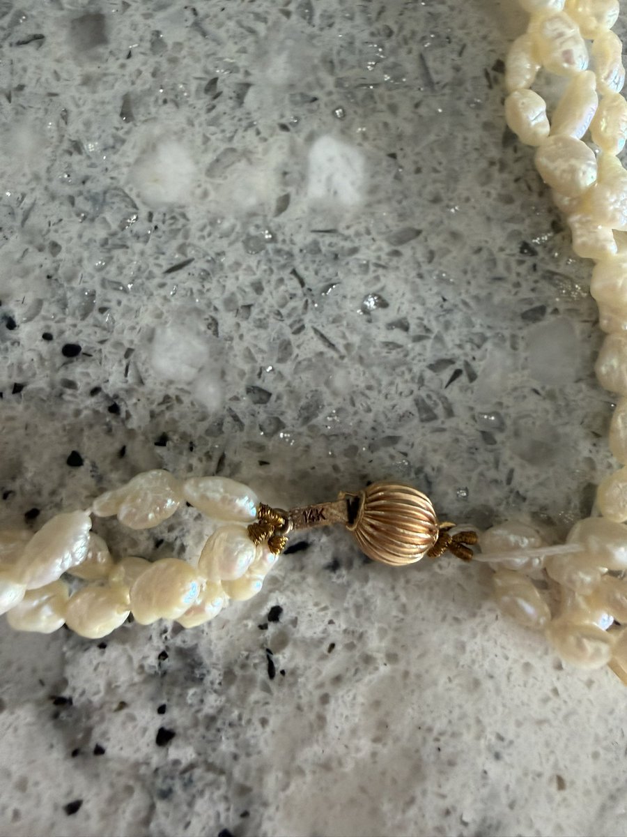 brattykittykate's tweet photo. turns out my grandfathers/grandmothers? vintage pearl necklace is real 14k gold after i randomly checked the clasp. i thought this was costume jewlery and ive kept this since i was 14😭 https://t.co/oeMai1nK2d