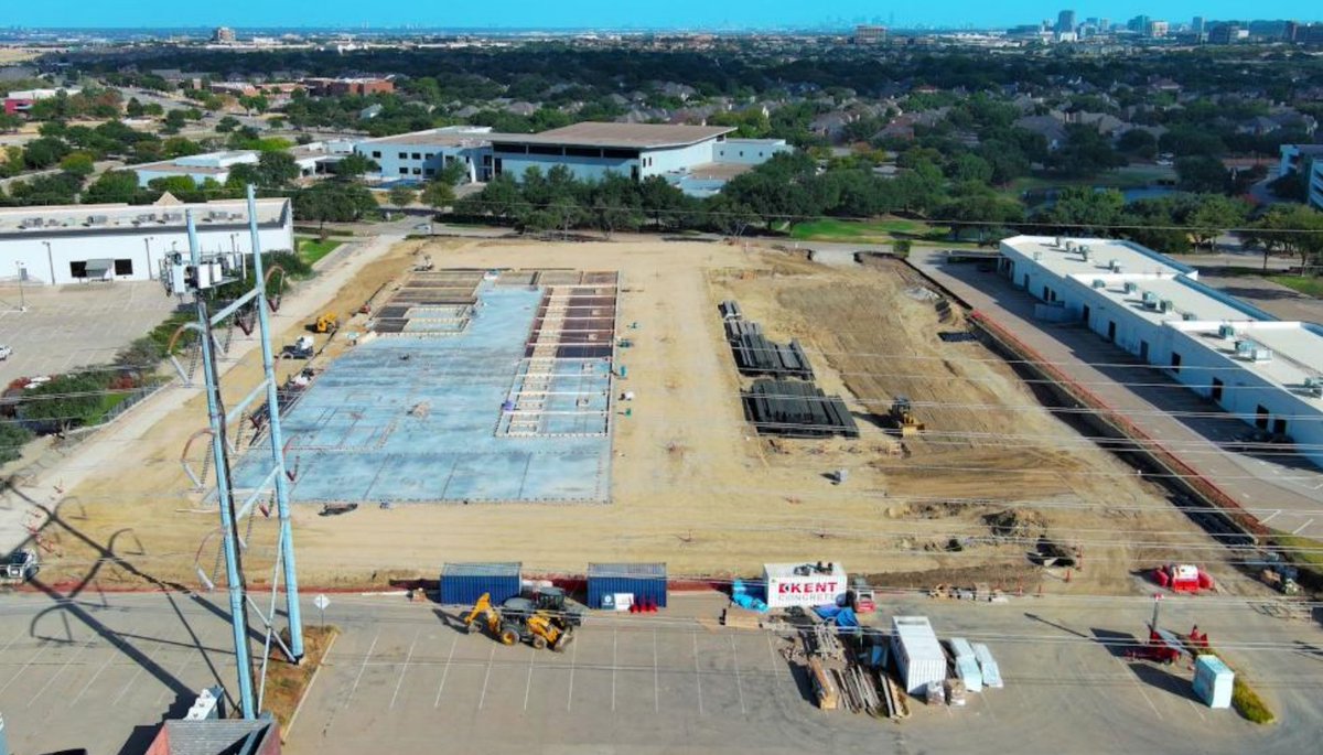 FoundryCRE's tweet photo. 🚧 Ridgepoint in Irving, TX, is progressing with a partial slab pour and work on panel forms and casting beds. Our 10th office-to-industrial redevelopment nationally, we’re transforming an outdated office site into a modern, 110KSF industrial facility. https://t.co/WkcpgOFUCL