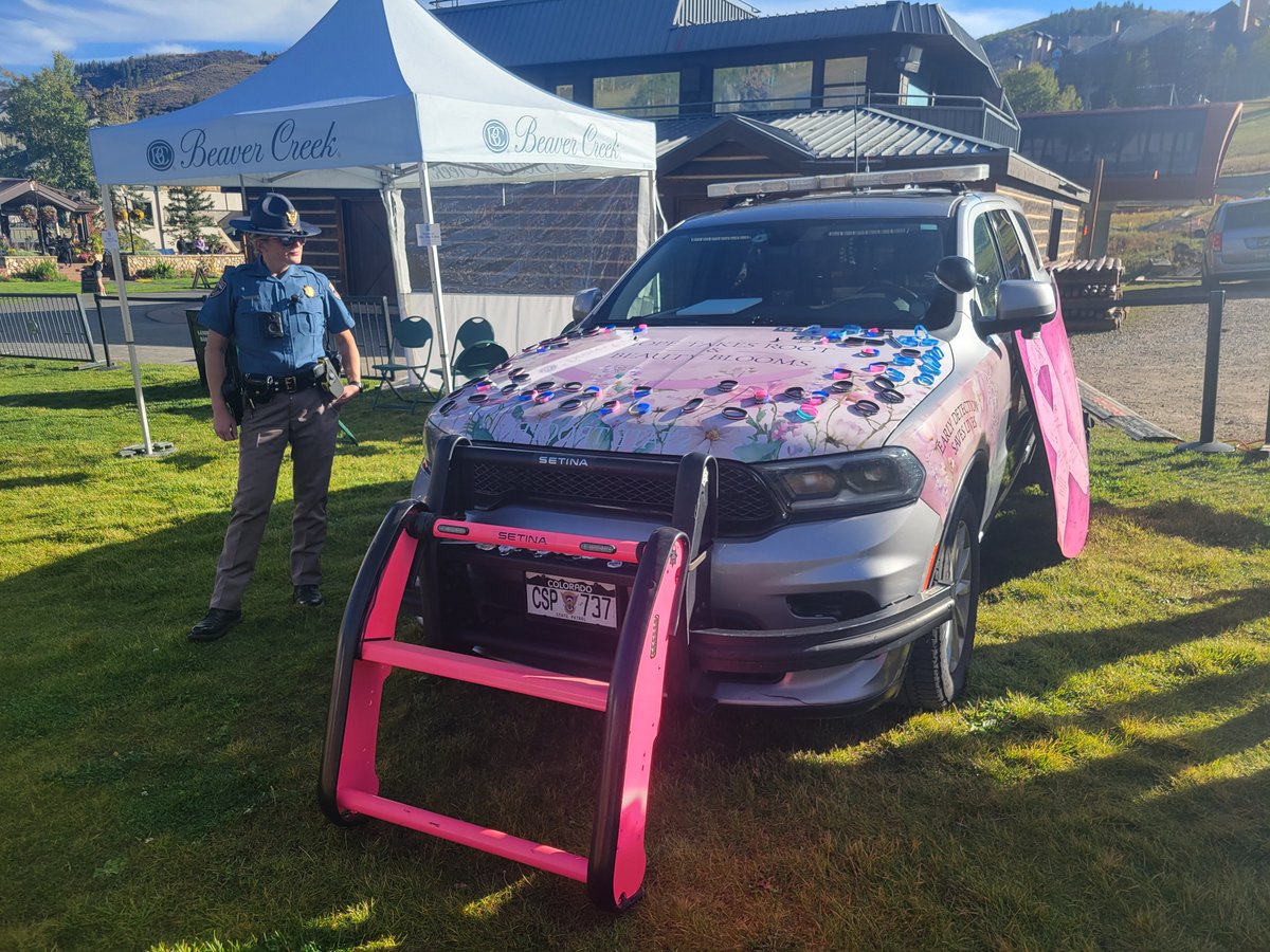 CSP_News's tweet photo. Last weekend, Trooper Cardoza from our Glenwood Springs Troop had a great time meeting the community at Vail's annual Shaw Cancer Awareness event. Where will the Pink Cruiser show up next? When you see us across the state with our Breast Cancer Awareness patrol cars, stop by and sign the vehicle in honor of a cancer survivor.