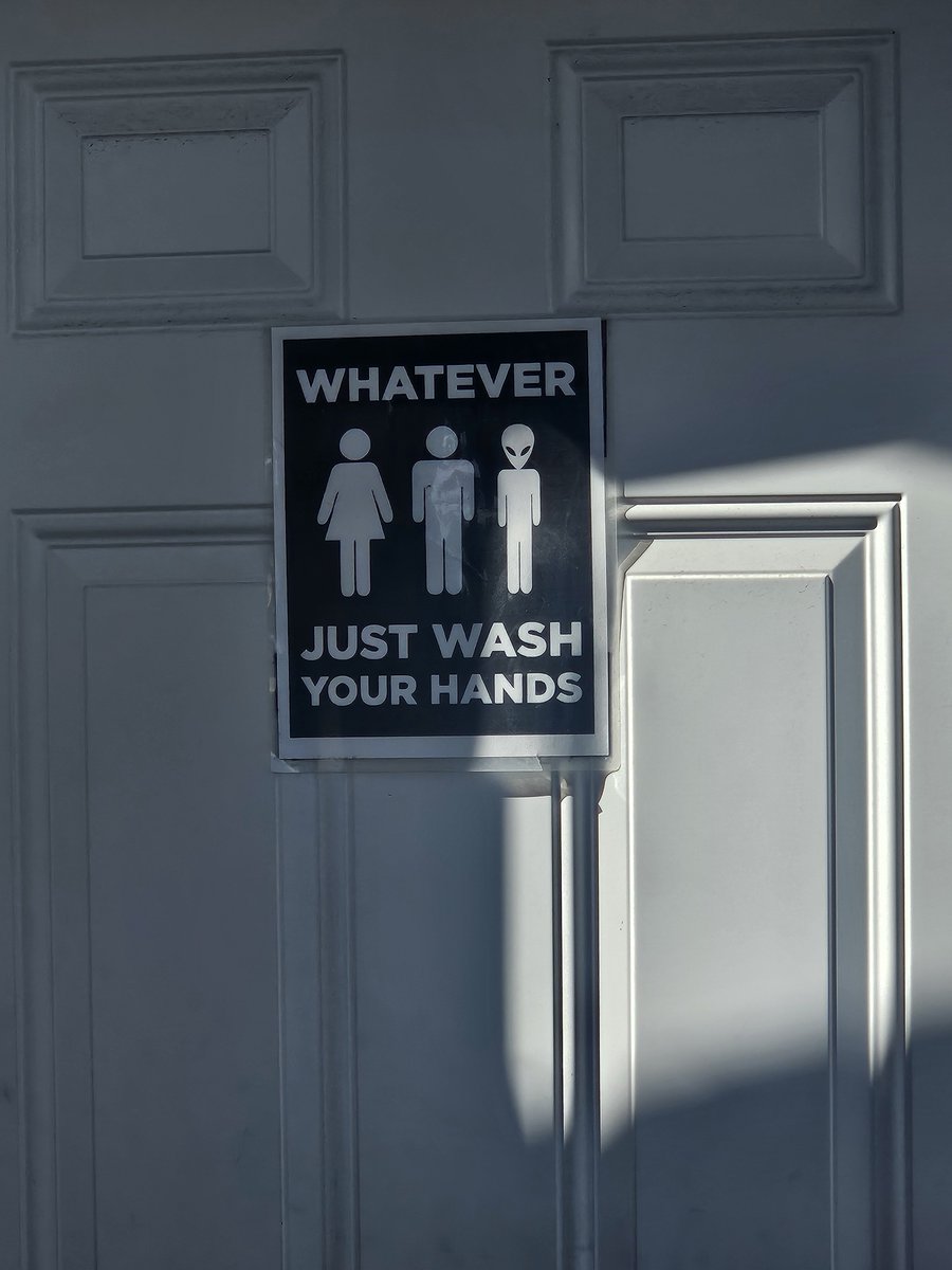 Shit_Dsturber's tweet photo. For those of you "triggered", specifically #MapleMagats & #MagaCultMorons, this is what's posted on a restroom door in the literal heart of Alberta's Cowboy country. WE DON'T CARE. JUST WASH YOUR HANDS! https://t.co/KI4PjIeYkG