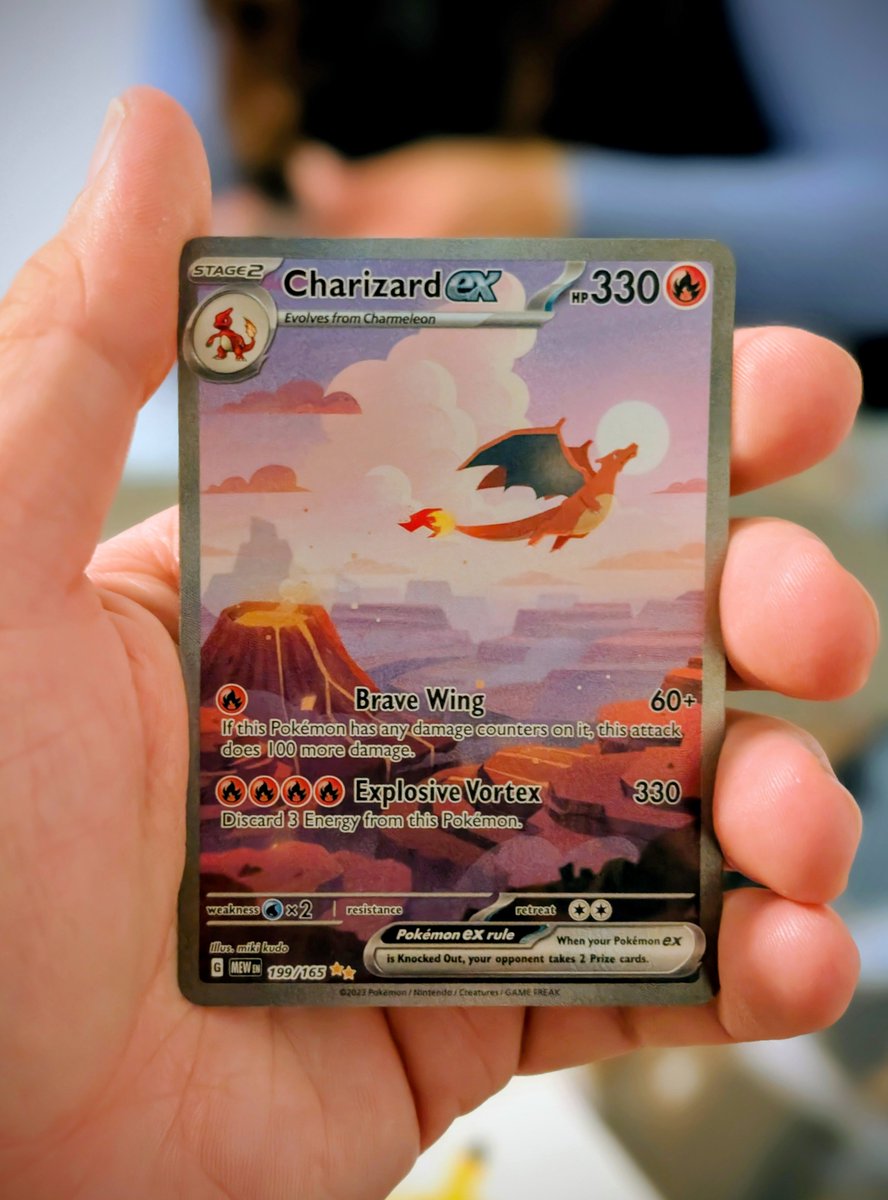 xanderzaps's tweet photo. Just pulled the Secret Rare Charizard ex chase card from the Pokémon 151 set! Unbelievable! The artwork for this card is simply amazing. Absolutely love the colors. https://t.co/GAVF52EauN