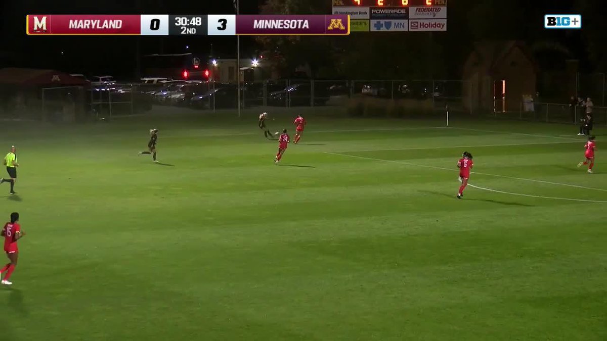 A nighttime college soccer match between Maryland and Minnesota, with the scoreboard showing Minnesota leading 3-0 at 30:48 in the 2nd half, broadcast on Big Ten Network.