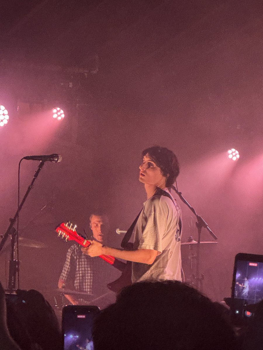 fwolfhardupdate's tweet photo. Finn Wolfhard performing at Scoot Inn for  ACL Fest Nights in Austin, Texas!

📸: @itwasa7yall via X/Twitter https://t.co/FGE0bwoJ0e