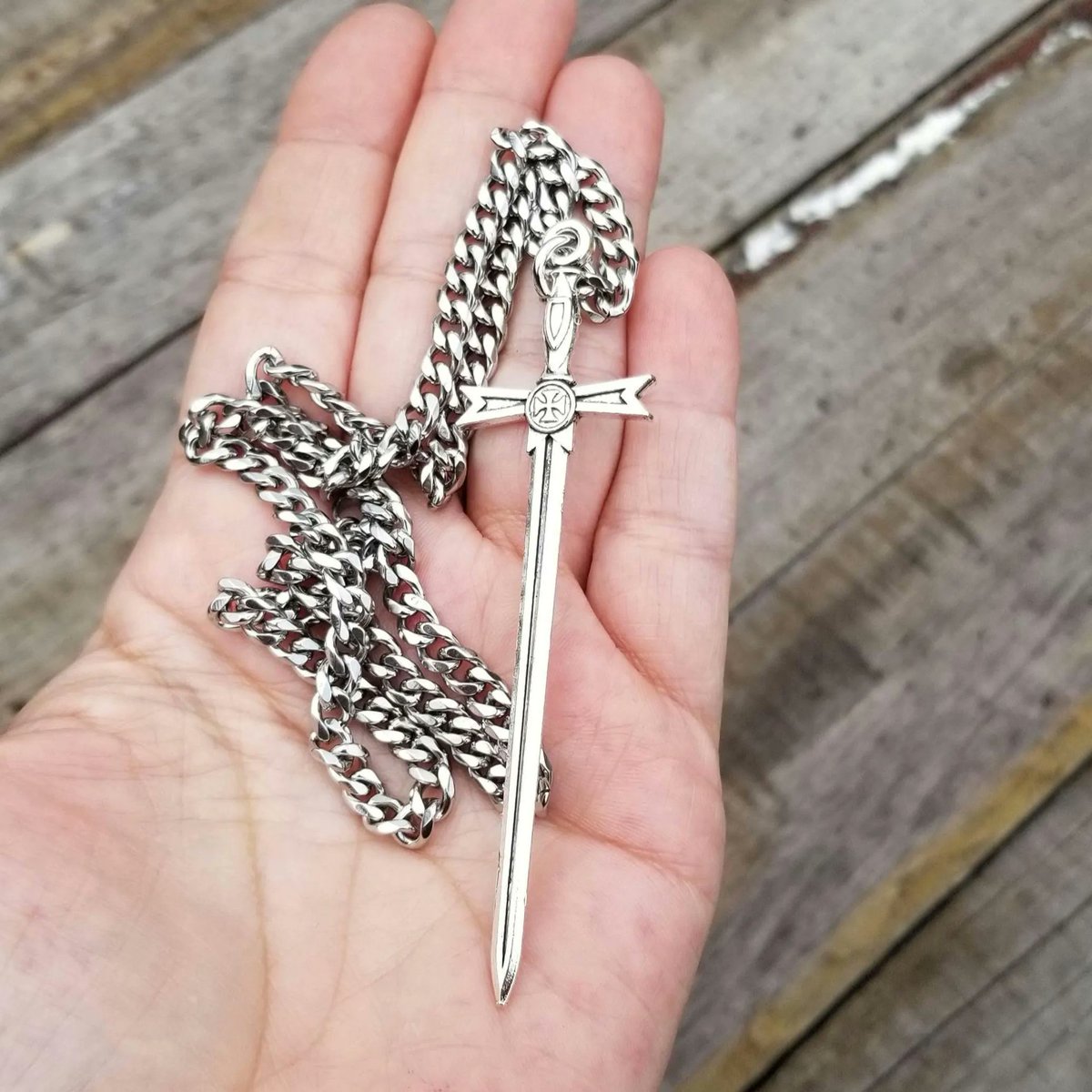 TrendingNowGift's tweet photo. 20" Stainless Steel 5mm Cuban Link Sword Necklace #jewelry #necklace #mensnecklace #sword #swordjewelry #swordnecklace #knightstemplar #knight #knights #medieval #handmadejewelry #etsy 

 https://t.co/1xeB8XAI64 via @Etsy https://t.co/BUCaS4iQg0