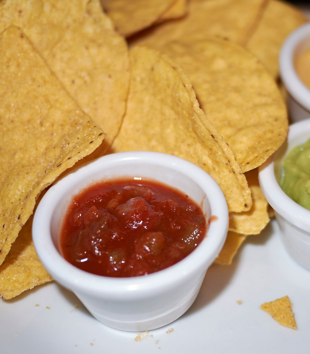 pubity's tweet photo. Trump tariffs have driven up tomato prices so much that many restaurants can no longer afford to give away free chips and salsa.

This could mean the end of free chips and salsa as we know it. https://t.co/w6Eiv1gtD9