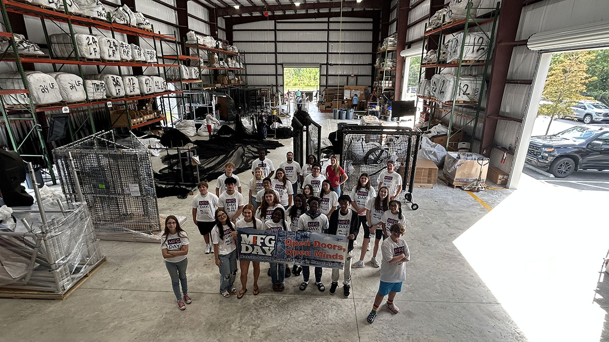 NettingPros's tweet photo. The next generation of the @NassauFL workforce spent #MFGDay26 with us. Yulee High School students toured our facility to see how we design, engineer, fabricate and install for sports facilities across the U.S. Thanks for visiting, students! @NassauFL @MfgDay https://t.co/DGymEP8NY6