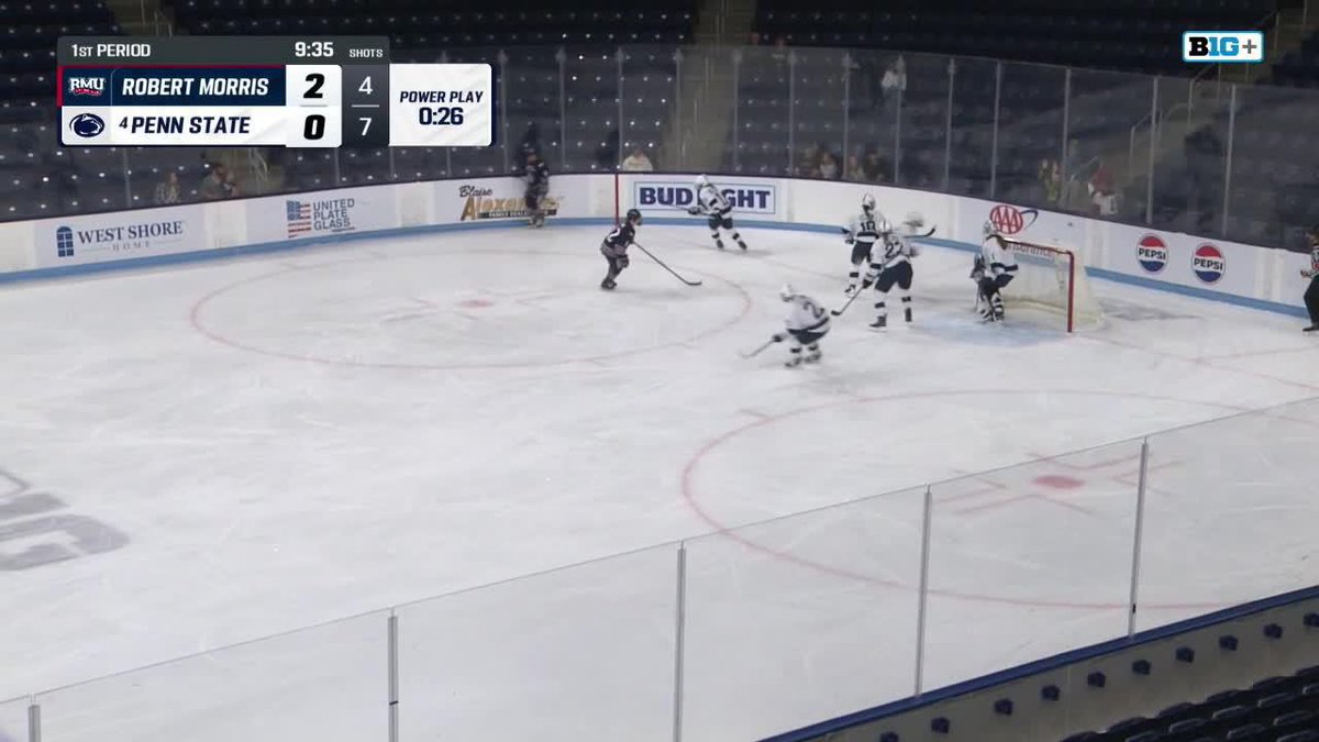 A broadcast from the BIG+ network shows an ice hockey game between Robert Morris and Penn State, with Robert Morris leading 2-0 during the 1st period with 9:35 remaining and a power play at 0:26.