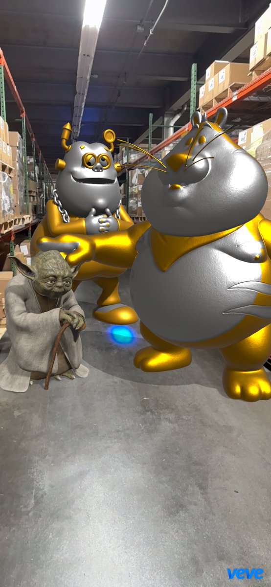 feehly2025's tweet photo. Ron English just clocked in for the warehouse shift 🏭Dropped his chrome crew right in the middle of my 9-to-5, and Yoda's over here supervising like he owns the place 😂Robot or the big cat who's running this shift? #veve #vevecollectibles #ronenglish #popaganda #yoda #starwars https://t.co/RDLKsktv7u