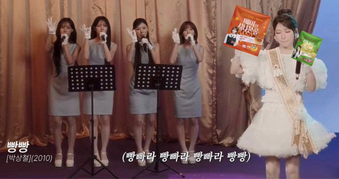 A Korean music show screenshot featuring a group of women in gray dresses singing, alongside another woman in a frilly white dress, with onomatopoeic Korean text suggesting snoring sounds.