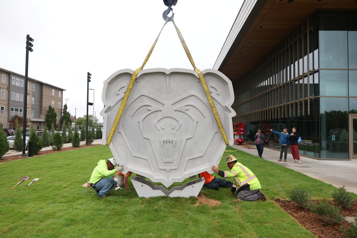 maroonation's tweet photo. A BIG Bear has arrived on campus. And we mean 9 feet big.

Our new Bear head is in place outside the Clifton M. Smart III University Advancement Center!

For now, admire it from the sidewalk while construction wraps up. We’ll see you at the Nov. 11 ribbon cutting.
#UACBear https://t.co/6MvfqnuKdA