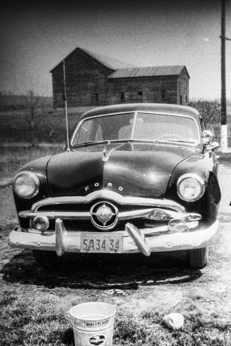 bcpix's tweet photo. My dad’s ‘48 (I think) Ford getting ready for a wash. Hope he scrubbed the bent grille and bumper extra good! #ford #classiccars from my photo archive at https://t.co/KZHwZnXowE https://t.co/DoFUoEpsCn