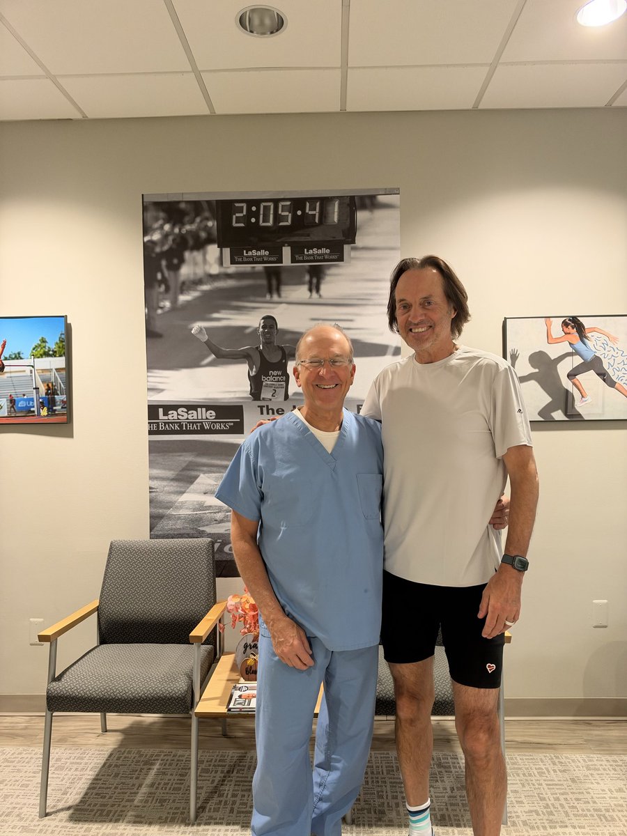 JohnLegere's tweet photo. Grateful to be working with one of the best, @DrJohnConnors , to help me get back on track. He’s worked with many runners including Chicago Marathon winners like the one in the photo behind us. He will get me to the starting line! https://t.co/hqAUo6LURl https://t.co/dCjQgYG8lW