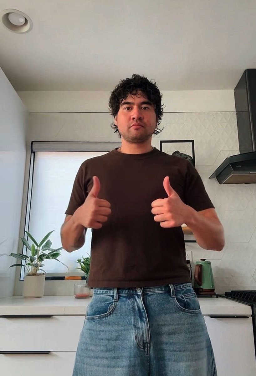 moodswiings's tweet photo. calum just casually having the perfect baby tees like okay https://t.co/0vC9I8OJYS