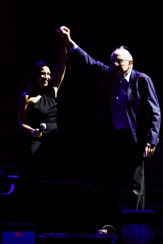 JoshuaMellin's tweet photo. AOC &amp; Bernie Sanders introduce The Strokes in Queens https://t.co/B7gauRImVJ
