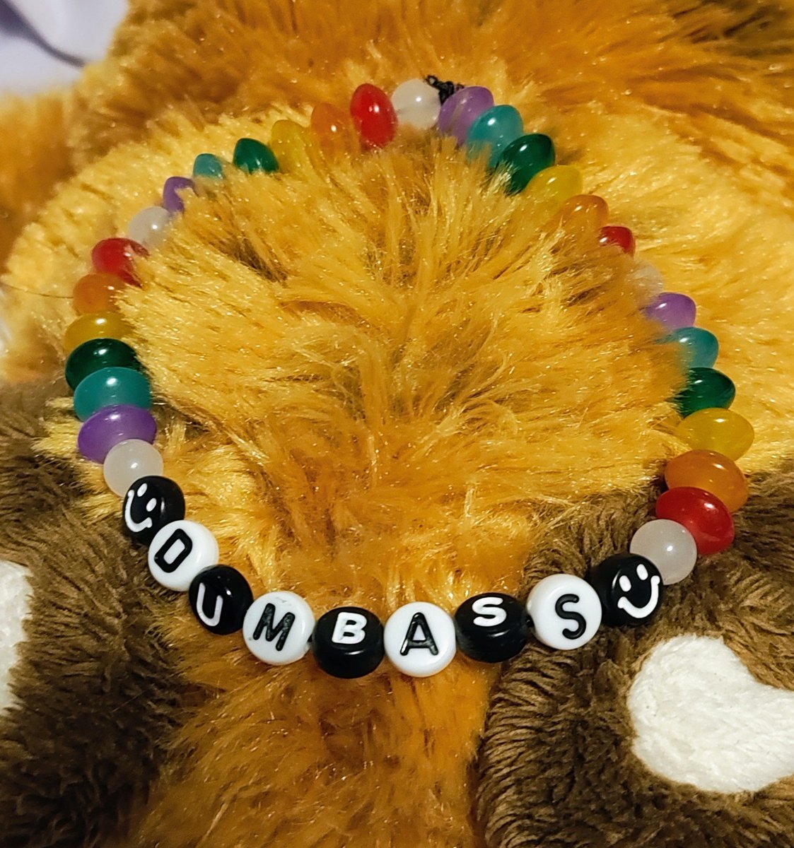 KruisCreations's tweet photo. Custom 8in beaded bracelet requested by my oldest brother!

He asked for 'dumbass' on the bracelet in black &amp; white, and the smiley face beads!

Made with 8mm Abacus 'glass' beads, white 6mm 'glass' beads, and letter beads!

#bracelet #handmadejewelry #handmade #beadedbracelets https://t.co/OGeJ4oPbwJ