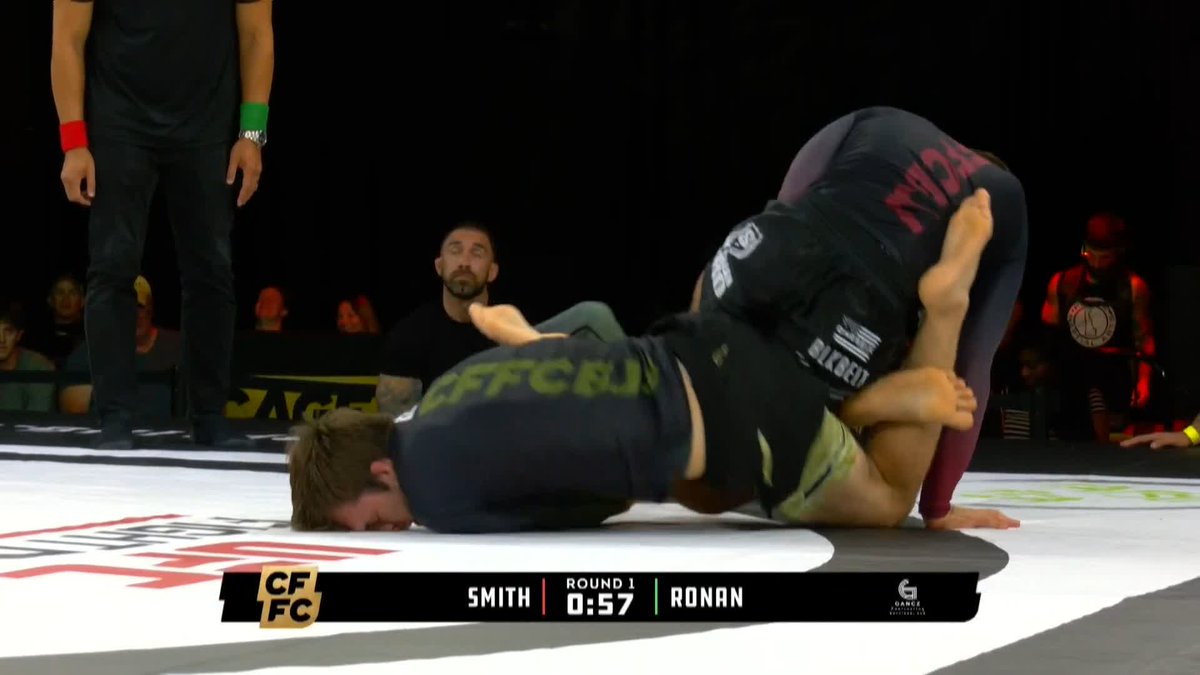 An MMA/CFC grappling match between fighters labeled 'SMITH' and 'RONAN', showing one fighter controlling the other on the mat with 0:57 remaining in Round 1.