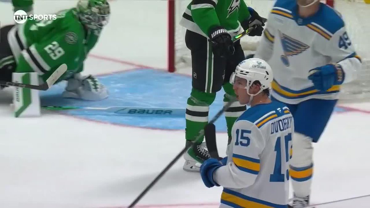 A TNT Sports broadcast screenshot of an NHL hockey game showing St. Louis Blues player #15 (Duchene) skating near the goal where Dallas Stars goaltender #29 is positioned.