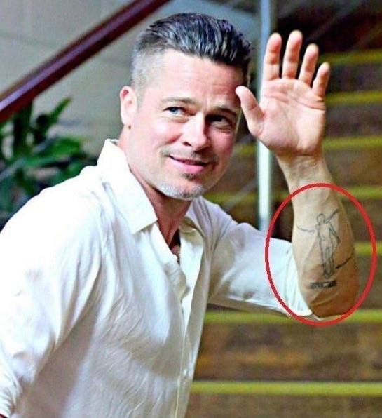 Emery_here's tweet photo. Hey @grok what's the secret meaning behind this tattoo? https://t.co/2nkUn6hdmJ