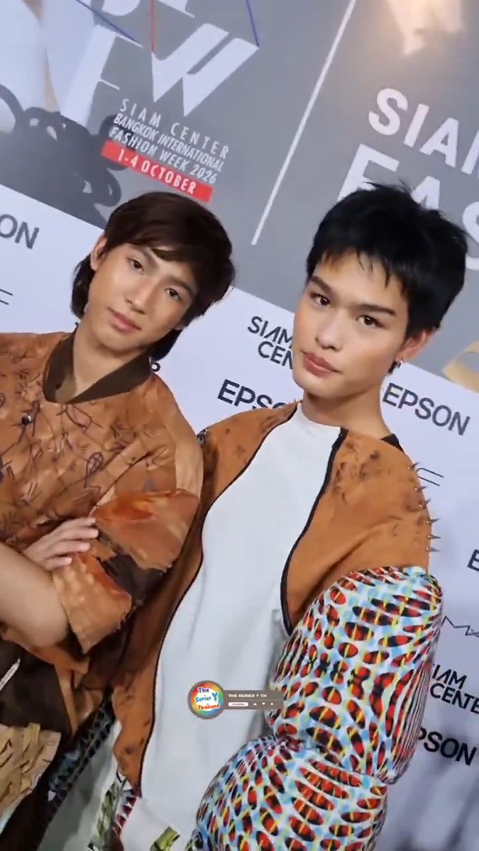 Two young men pose together at 'SIAM CENTER BANGKOK INTERNATIONAL FASHION WEEK 2026' on '1-4 OCTOBER', with 'EPSON' logos visible in the background.