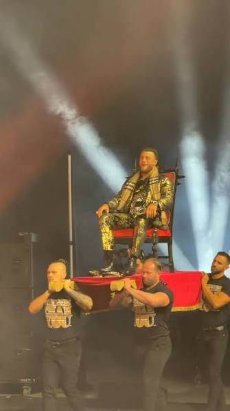 DFW_Wrestling's tweet photo. @MandlaNgannou @VincentCrossDFW @MKingsley_DFW's THEME HITS!

The camera cuts to the stage, where Miles Kingsley is being brought in onto the stage, on a special Red Throne, a massive smirk on his face. He jumps off, The Atlantic Championship rests on his waist. He storms to the ring. Ready to defend. https://t.co/FVsKP3PRHE