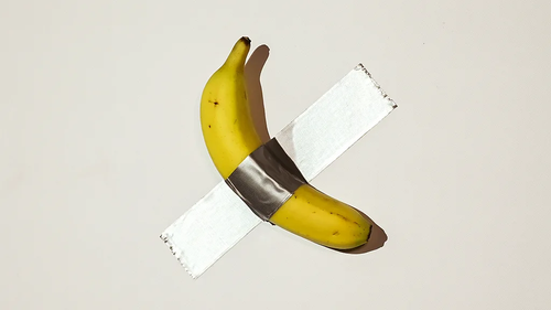 DavidRulerIFA's tweet photo. By sticking a banana to a wall with silver duct tape and calling it art, Maurizio Cattelan created one of the greatest cultural controversies of recent times. https://t.co/tJgm8XzlvF https://t.co/YEF86oD5wa