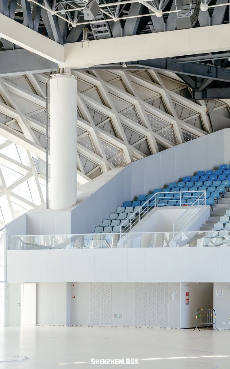 ShenzhenPages's tweet photo. Shenzhen's Dapeng Sports Center in Baguang area resembles a giant ark resting by the sea. The new landmark comprises a cultural center, a sports center, and Baguang Central Park, all interconnected by canyon‑style corridors.

Currently, the badminton courts and basketball courts at the venue are open to the public. The swimming pool is not yet accessible.

Once fully operational, the cultural center will feature a 1,200‑seat grand theater equipped with a lift stage and immersive audio, a 406‑seat black‑box theater, a library with a collection of 300,000 books, and an exhibition and event space. Floor‑to‑ceiling windows throughout the venue face Baguang Bay.

Source: Amazing Shenzhen