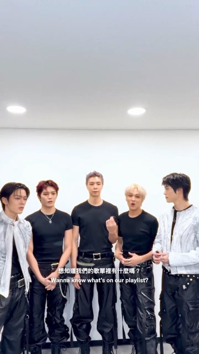 Five members of NCT stand together in a white room wearing black and white outfits, with bilingual subtitles reading "想知道我們的歌單裡有什麼嗎？ Wanna know what's on our playlist?" displayed on screen. The post references Haechan and Vogue Hong Kong, promoting songs like "Kick It," "Getaway," and "Punch" that the group is discussing.