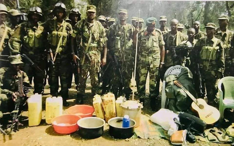 KakwenzaRukira's tweet photo. Lunatic Muhoozi was sent to capture Kony and he captured his saucepans and basins instead. And without shame, he paraded them for pictures https://t.co/YSSS1pjRUI