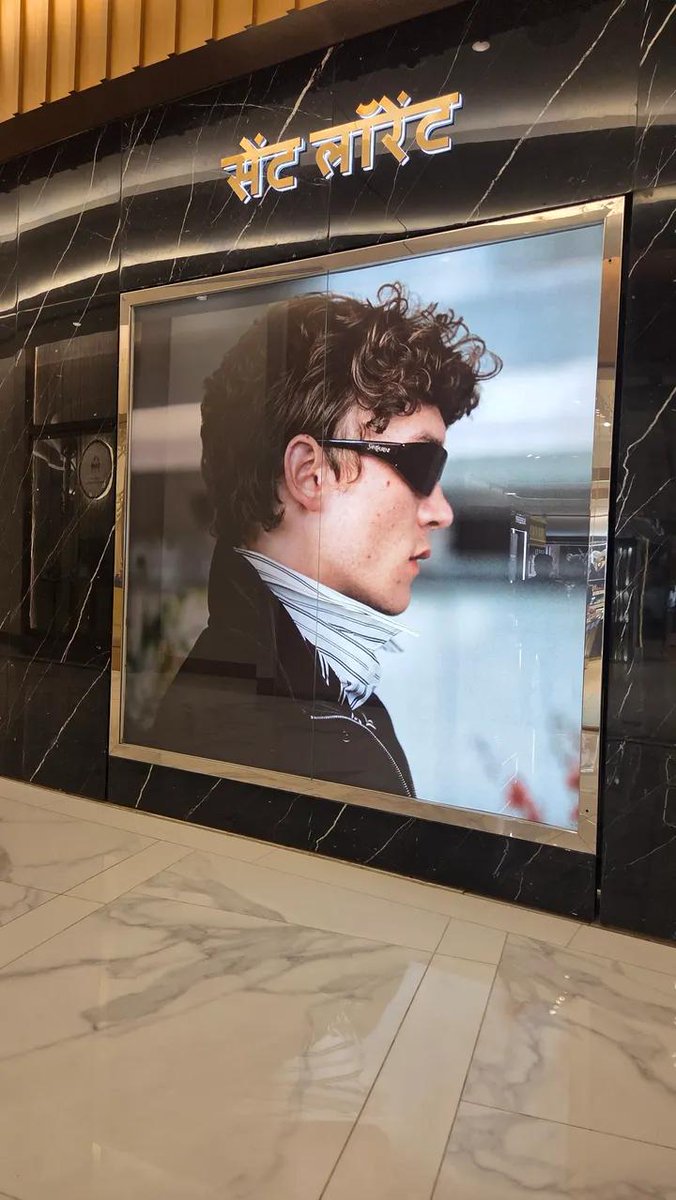 StorrieNation's tweet photo. Connor Storrie’s Saint Laurent Fall 2026 campaign on display at the YSL flagship store in Mumbai, India. 🇮🇳 ❤️

📷 brieandvodka via Threads https://t.co/CKuQbwmI1X