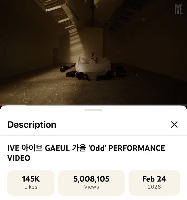 A screenshot of a video description for 'IVE 아이브 GAEUL 가을 'Odd' PERFORMANCE VIDEO' showing 145K likes, 5,008,105 views, dated Feb 24 2026, featuring a dimly lit room with a bed.