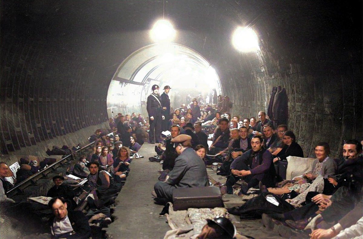 englandincolour's tweet photo. People shelter and sleep on the platform and on the train tracks in Aldwych Underground Station London after sirens sounded to warn of German bombing raids on October 8 1940. https://t.co/OFTzoEy9u7