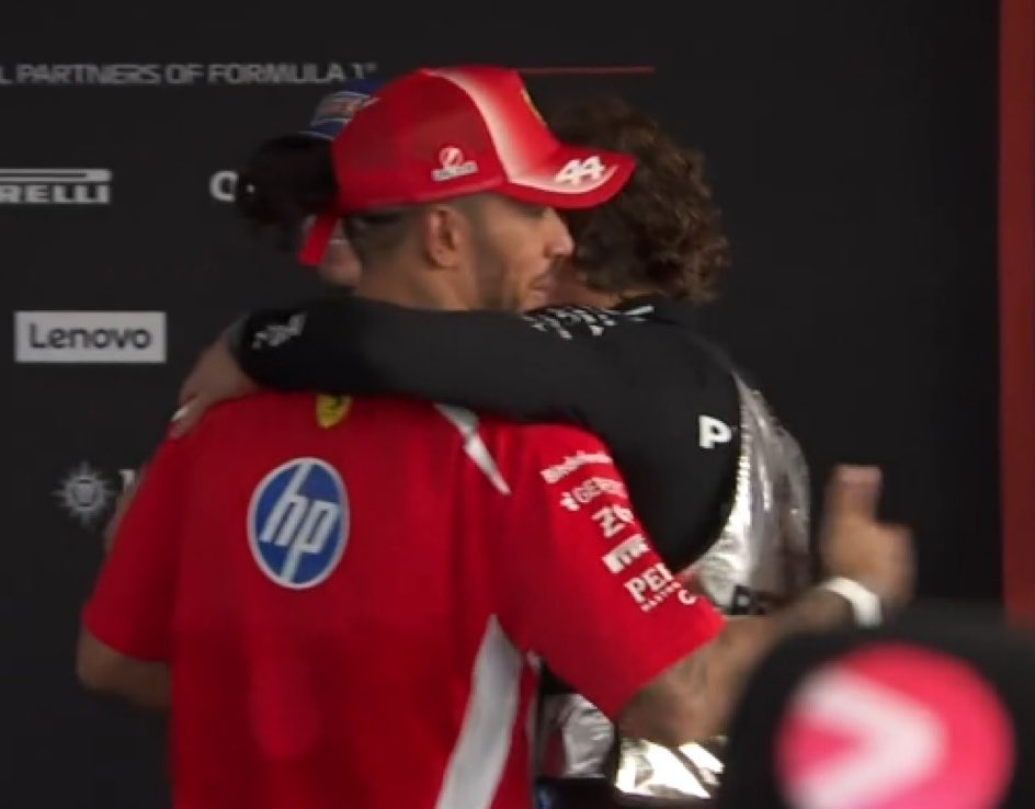 simscircuit's tweet photo. KIMI CONGRATULATING LEWIS IN THE MEDIA PEN! https://t.co/6amnEKlmDc