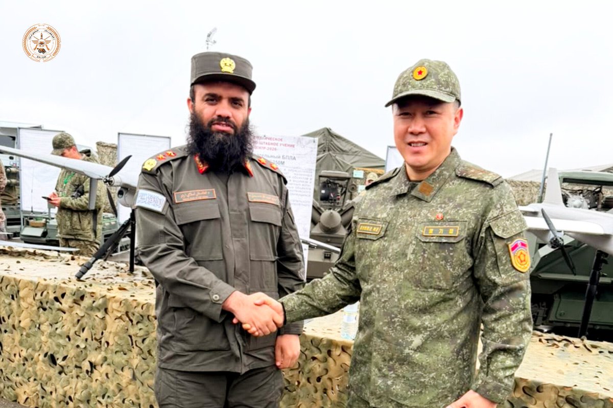 NguyenBinh98509's tweet photo. A KPA officer shaking hand with a Taliban guy. Taken during Center-2026 military exercise in Russia. https://t.co/IZBN3jz9VM
